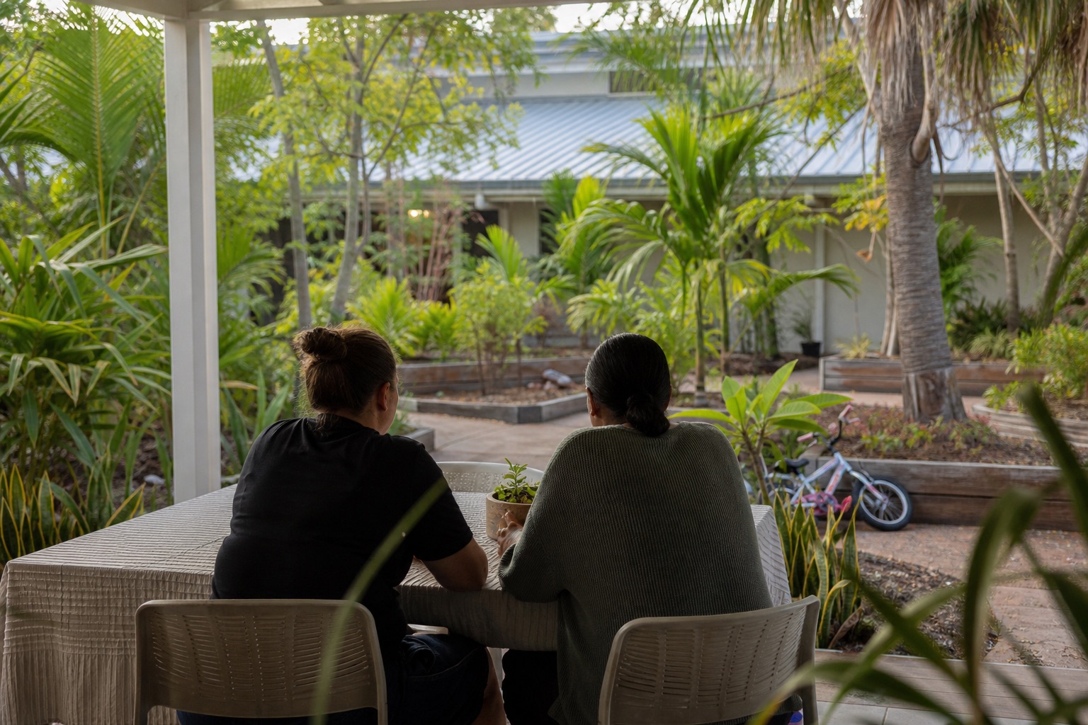 The shaded play area and self-contained units at the Top End Women's Shelter accommodation in Darwin